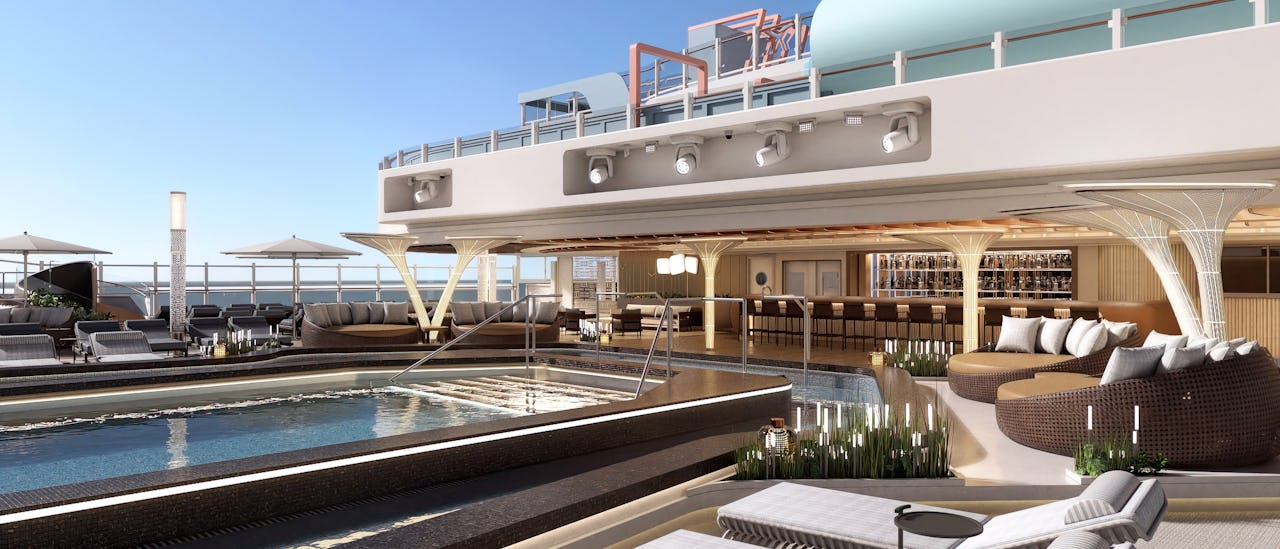 Slappe av i solsengene ved bassenget